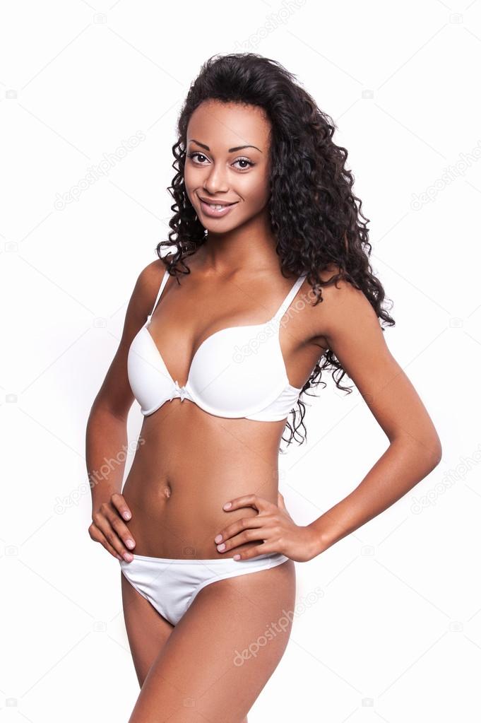 Afro-American woman in white bra and panties