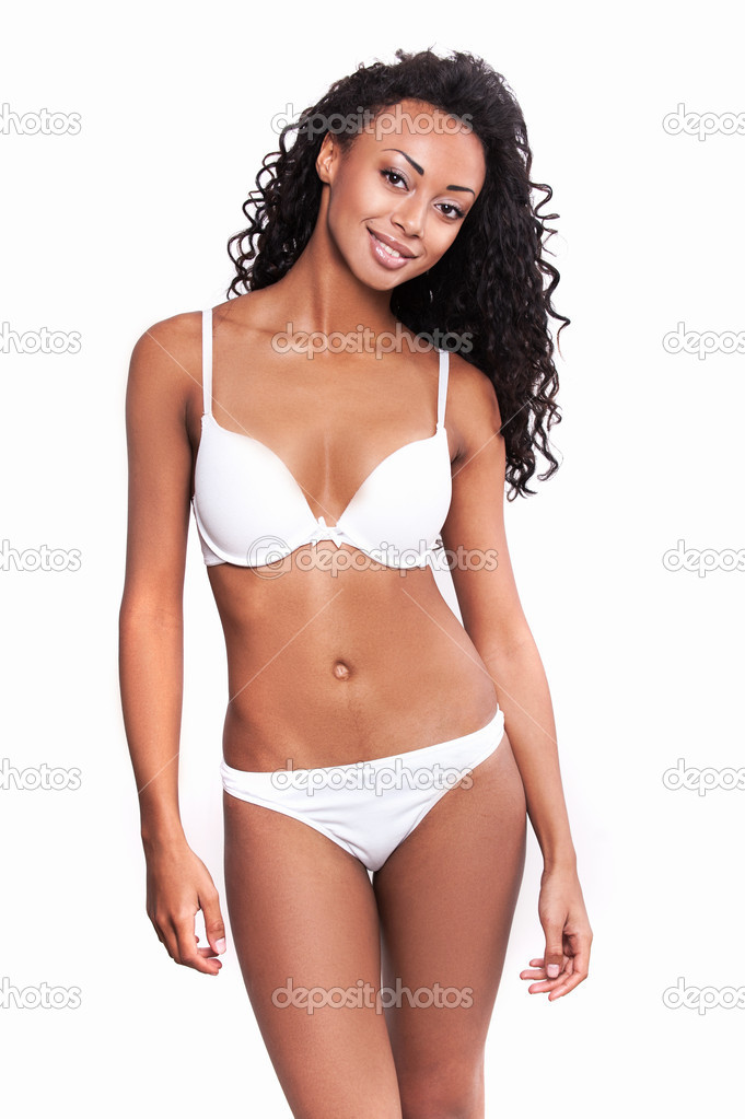 Afro-American woman in white bra and panties Stock Photo by