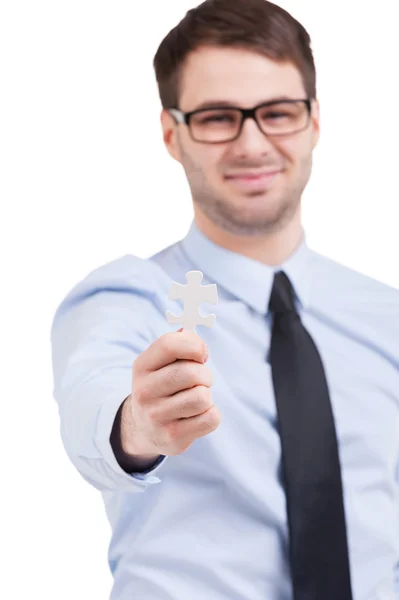 Mann mit Puzzle-Element. — Stockfoto