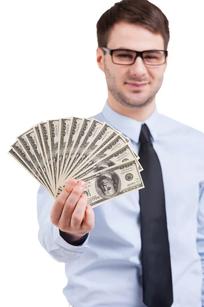 Man in shirt and tie holding paper currency — Stock Photo, Image