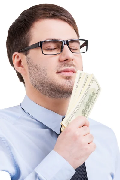 Man in shirt and tie holding paper currency — Stock Photo, Image