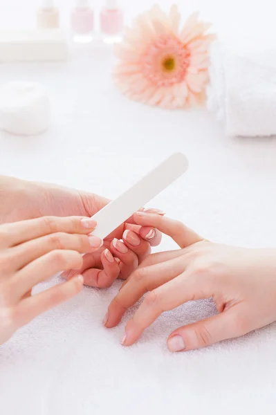 Polishing female nails. — Stock Photo, Image