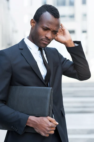 Thoughtful young African man — Stock Photo, Image