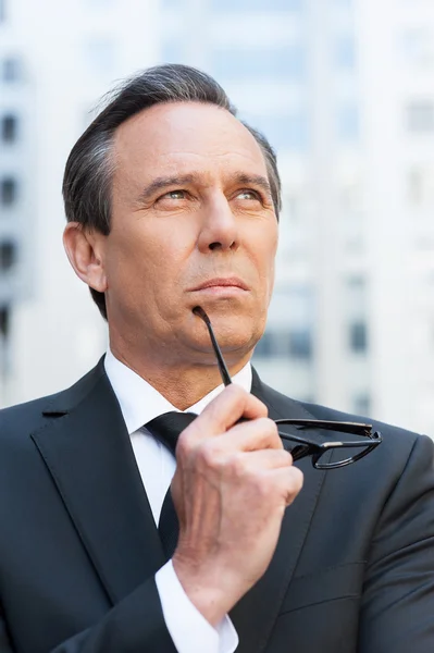 Thoughtful mature businessman — Stock Photo, Image