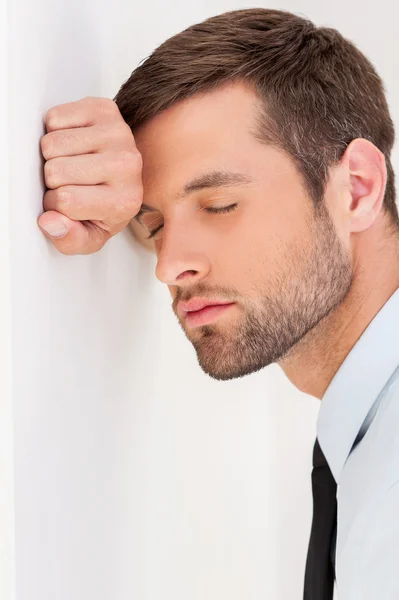 Depressed young man in shirt — Stock Photo, Image