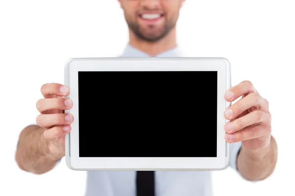 Man in formalwear showing digital tablet — Stock Photo, Image