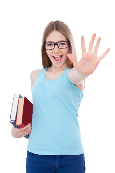Adolescente menina segurando livros — Fotografia de Stock