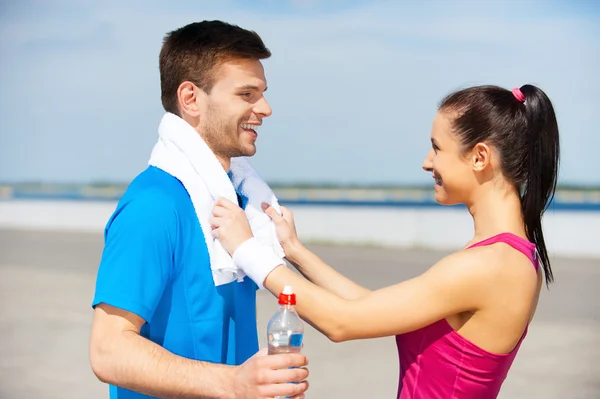 Couple in sports clothing — Stock Photo, Image