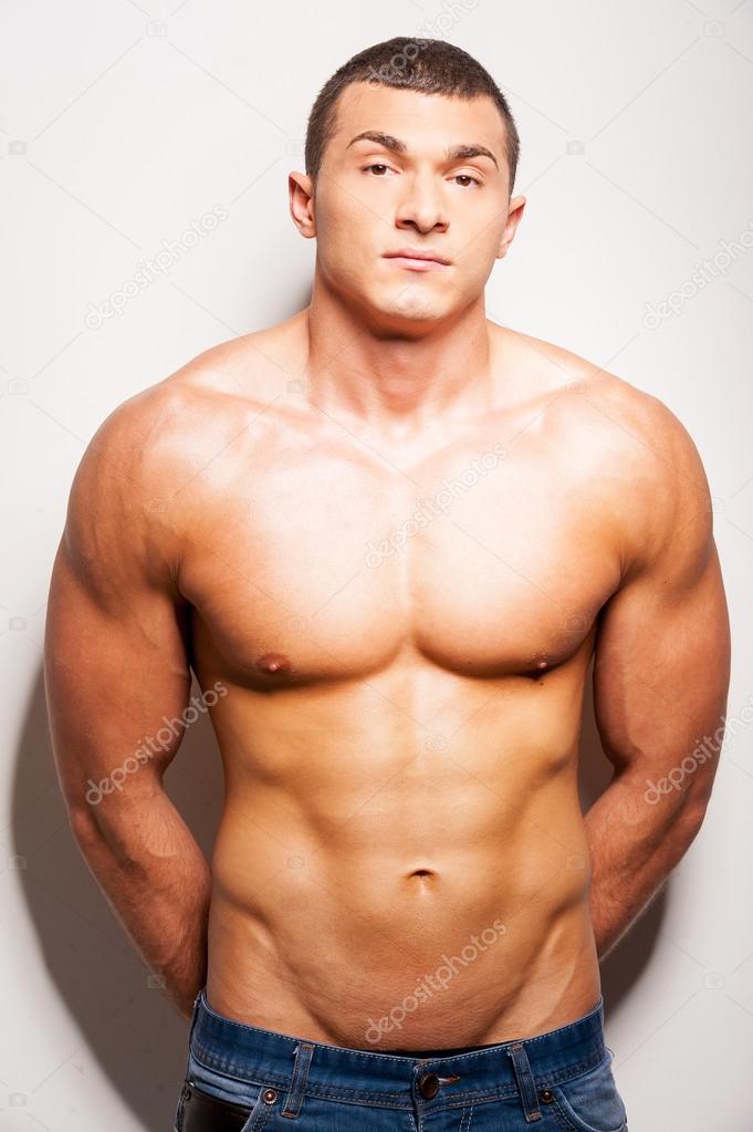 Strong and muscular shirtless man