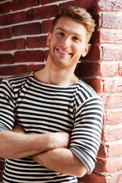 Young man in striped shirt — Stock Photo, Image