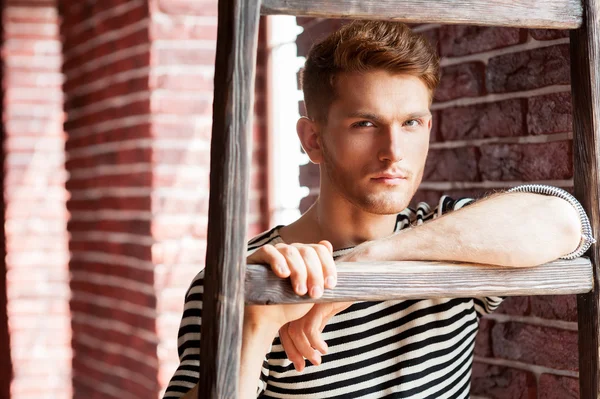 Young man in striped shirt — Stock Photo, Image