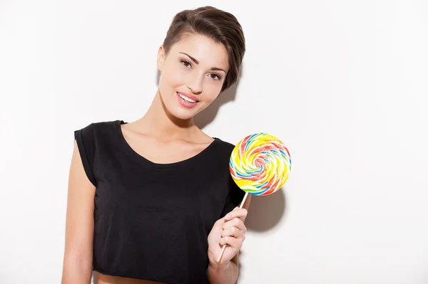 Woman holding big lollipop — Stock Photo, Image