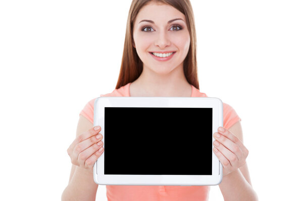 Woman showing her digital tablet