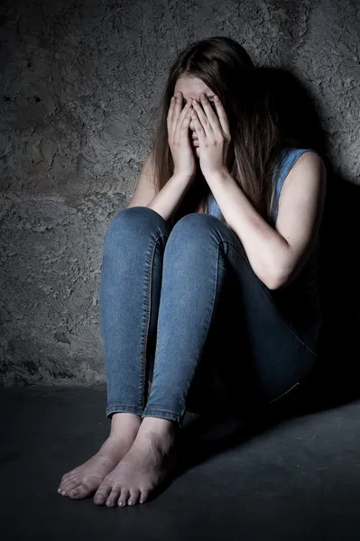 Woman covering face with hands — Stock Photo, Image