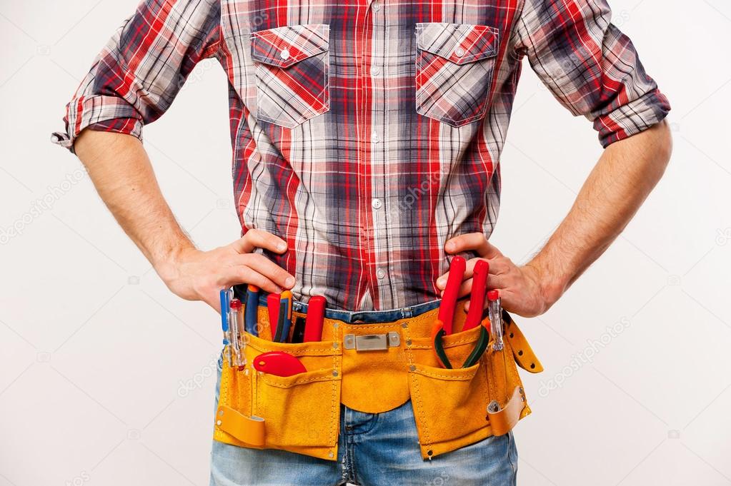 Handyman with tool belt — Stock Photo © gstockstudio 47319939