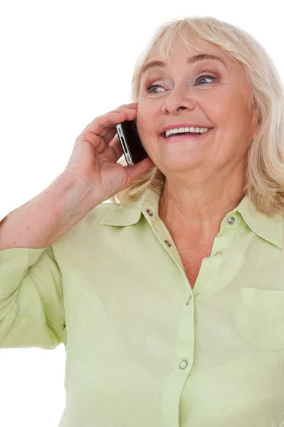 Seniorin telefoniert mit Handy — Stockfoto