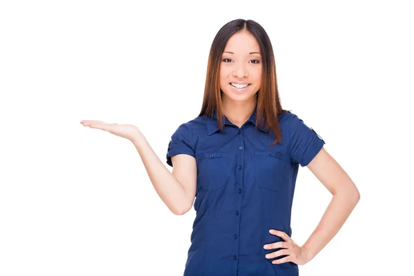 Asian woman holding a copy space — Stock Photo, Image