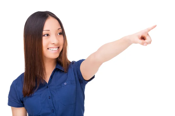 Asian woman pointing away — Stock Photo, Image
