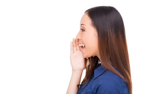 Asian woman shouting and holding hand near mouth — Stock Photo, Image