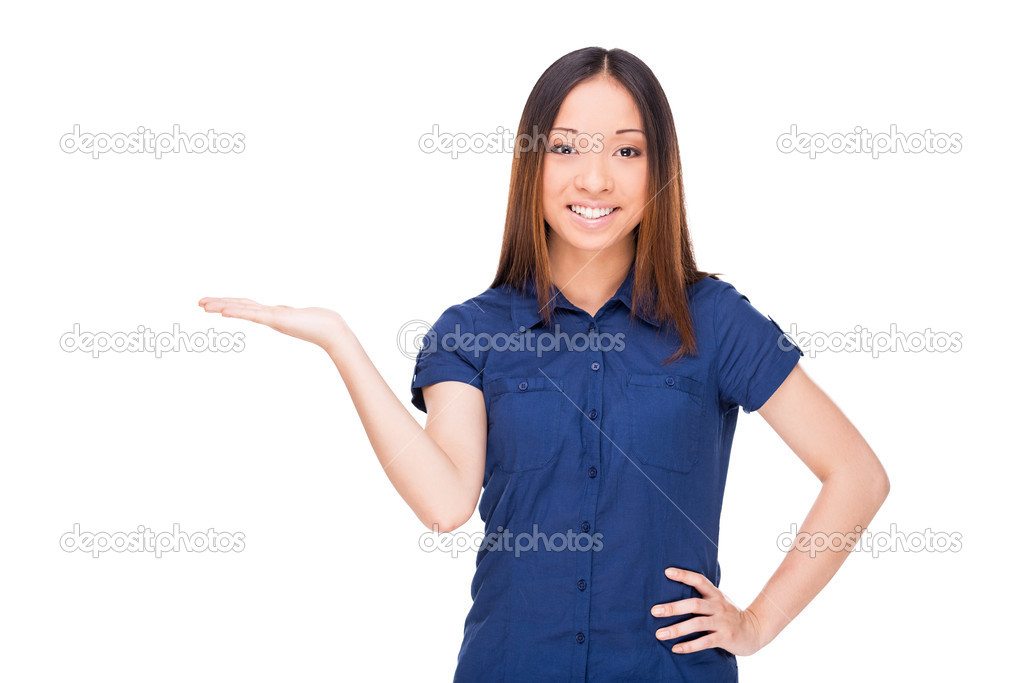 Asian woman holding a copy space