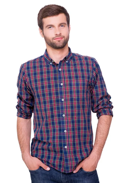 Man in casual shirt holding hands in pockets — Stock Photo, Image