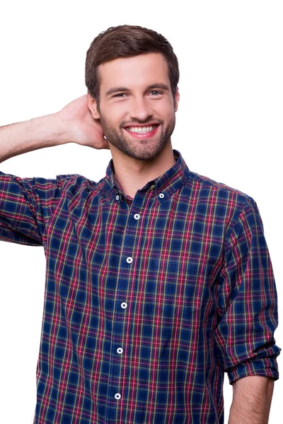 Young man holding hand behind head — Stock Photo, Image