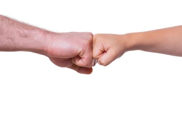 Adult and child fists — Stock Photo, Image