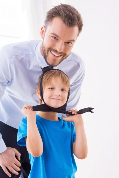 Boy playing with necktie — Stock Photo, Image