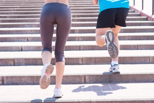 Woman and man running — Stock Photo, Image