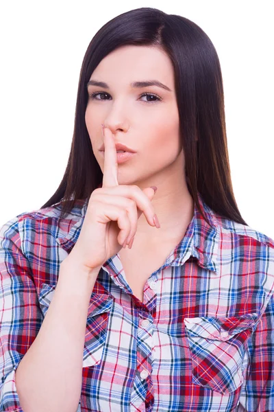 Woman holding finger on lips — Stock Photo, Image