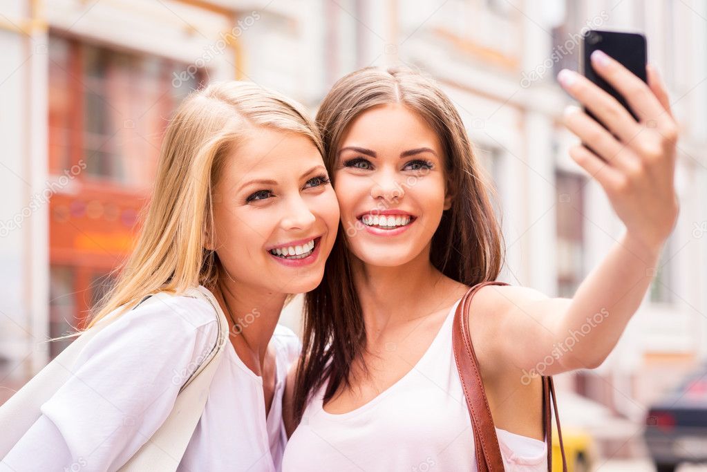 Women making selfie