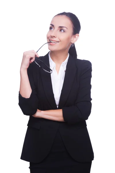 Woman in formalwear carrying eyeglasses — Stock Photo, Image