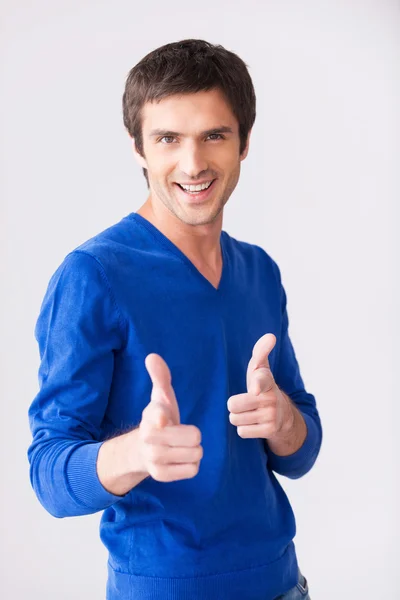 Handsome young man in blue sweater — Stock Photo, Image