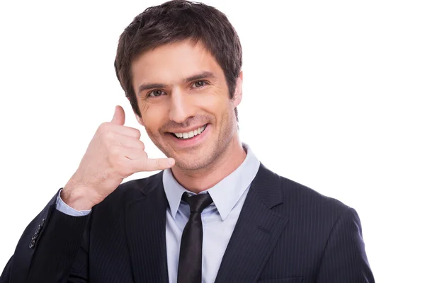 Hombre con camisa y corbata gestos de teléfono móvil — Foto de Stock