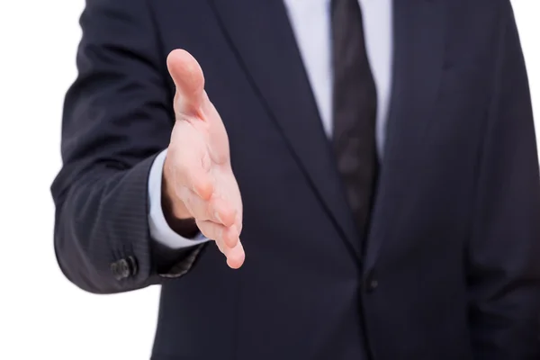 Businessman stretching out hand for shaking — Stock Photo, Image