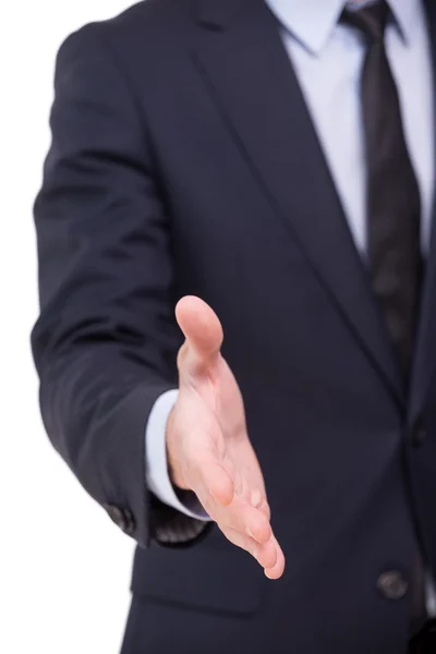 Businessman stretching out hand for shaking — Stock Photo, Image