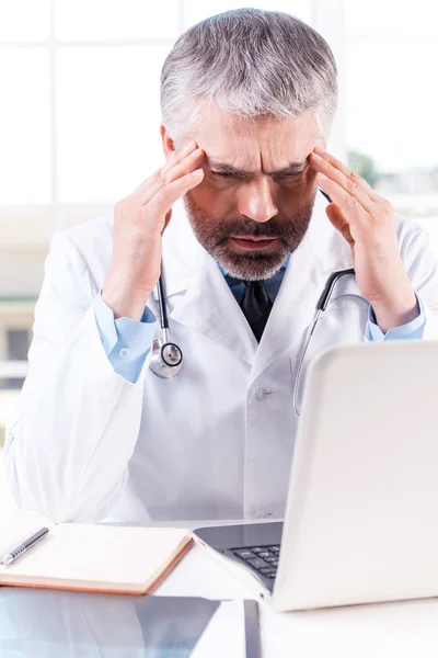 Stressed and tired doctor. — Stock Photo, Image