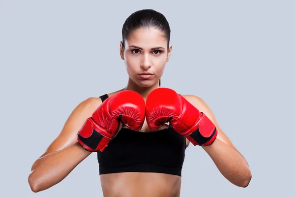 Sporty woman in boxing gloves — Stock Photo, Image