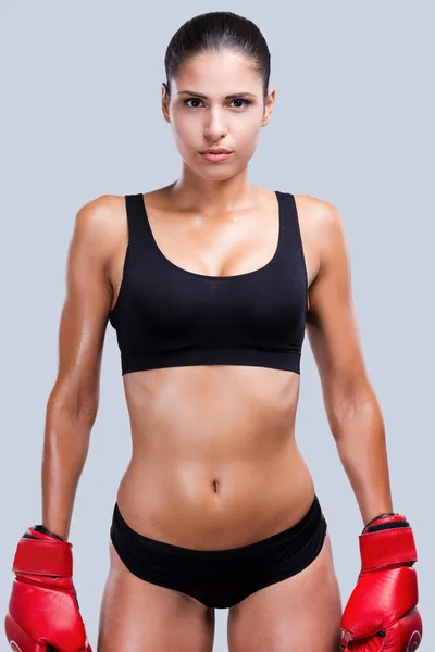 Sporty woman in boxing gloves — Stock Photo, Image