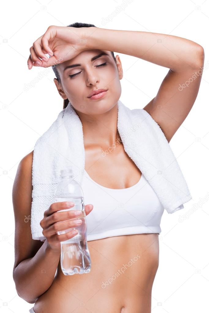 Woman holding bottle with water