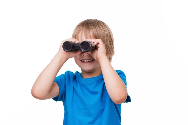 Boy looking through binoculars — Stock Photo, Image
