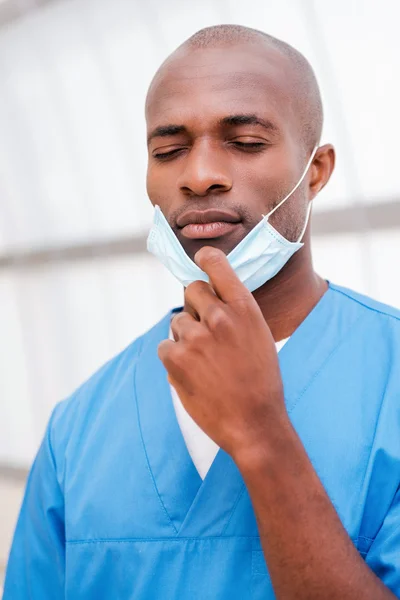 African doctor tired after long surgery. — Stock Photo, Image