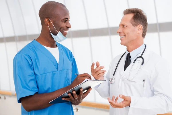 Confident doctors discussing something — Stock Photo, Image