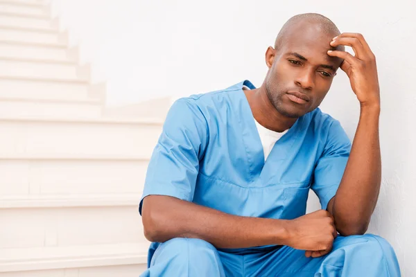 African doctor feeling tired and depressed. — Stock Photo, Image