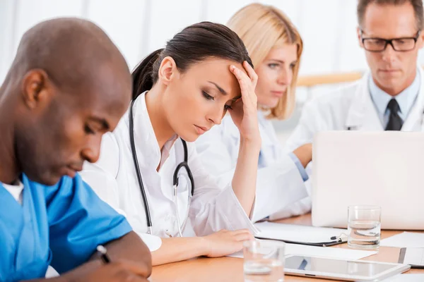 Female doctor feeling tired and depressed. — Stock Photo, Image