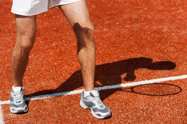 Close-up van tennis speler benen — Stockfoto