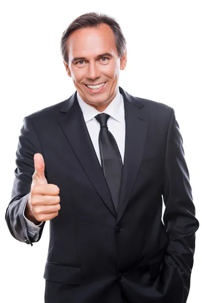 Cheerful businessman showing thumb up — Stock Photo, Image