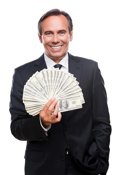 Hombre de negocios confiado sosteniendo dinero — Foto de Stock