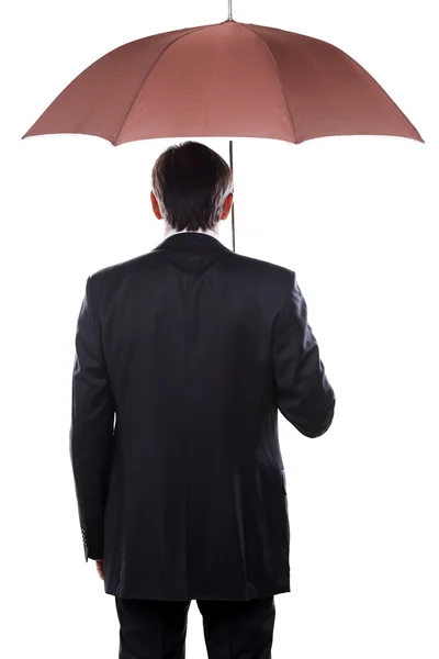 Businessman holding umbrella — Stock Photo, Image