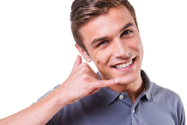 Young man gesturing mobile phone — Stock Photo, Image